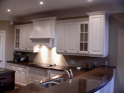 Glass and Solid Wood Cabinets in White Kitchen