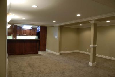 encased support posts in basement