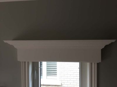 detailed trim above windows